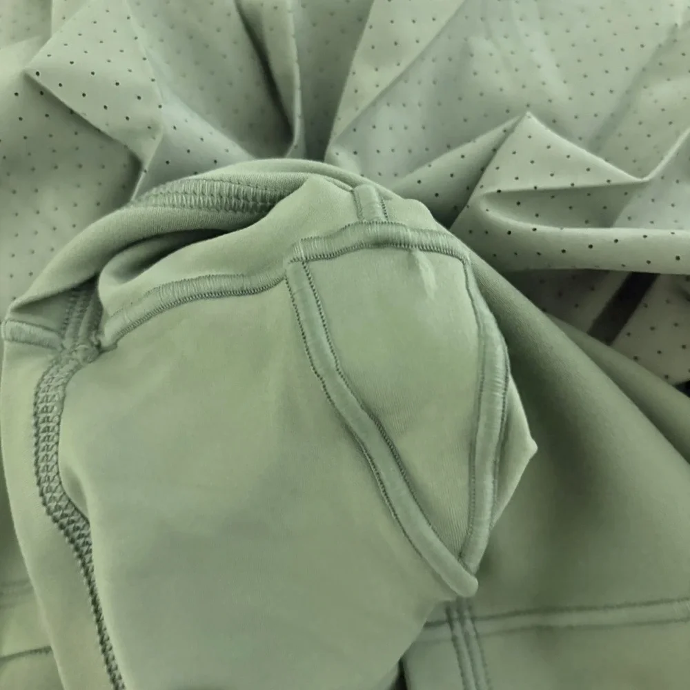 OFFLINE by Aerie Pleated Tennis Skort Women Medium Green Perforated Activewear